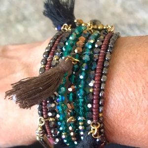 Beaded cuff bracelet accented w tassels, chains and drop beads